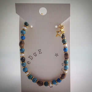 Beaded bracelet - Turquoise ceramic, wood and white beads with gold star pendant - eDgE dEsiGn London