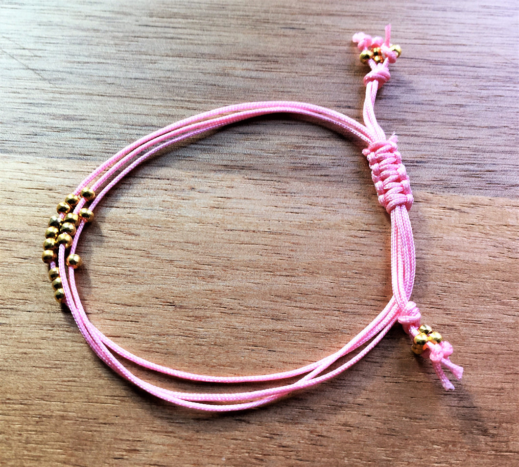 Pink triple strand cord bracelet with 9ct gold seed beads - eDgE dEsiGn London