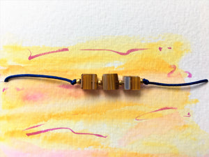 Beaded blue cord bracelet - Venetian Millefiori cube and gold seed beads - eDgE dEsiGn London