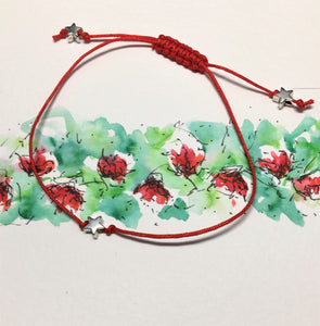 Single strand red cord bracelet with silver stars - adjustable sliding knot fastening - eDgE dEsiGn London