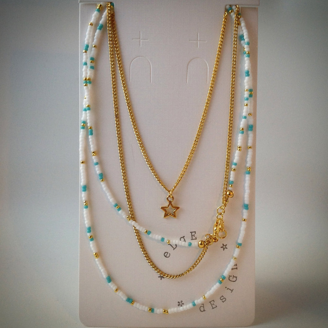Beaded necklace with gold chain - white and turquoise beads and star pendant - eDgE dEsiGn London