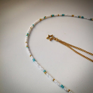 Beaded necklace with gold chain - white and turquoise beads and star pendant - eDgE dEsiGn London