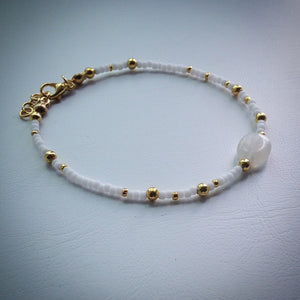 Beaded bracelet - white and gold seed beads and oval clear quartz bead - eDgE dEsiGn London