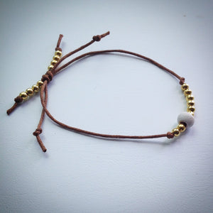 Adjustable sliding knot cord bracelet - brown with vintage white wooden bead and gold beads - eDgE dEsiGn London