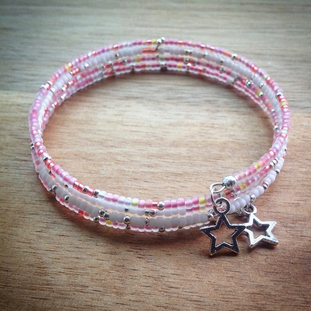 Beaded memory wire bracelet - white, pink, yellow and silver seed beads and silver star pendants - eDgE dEsiGn London