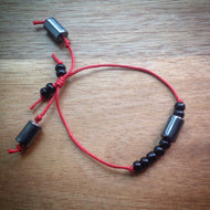 Adjustable sliding knot cord bracelet - red cord with black beads and grey Hematite Tube beads - eDgE dEsiGn London