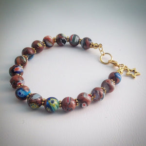 Beaded Bracelet - Millefiori beads and gold spacers and star - eDgE dEsiGn London