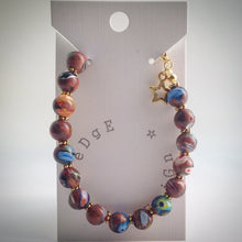 Beaded Bracelet - Millefiori beads and gold spacers and star - eDgE dEsiGn London