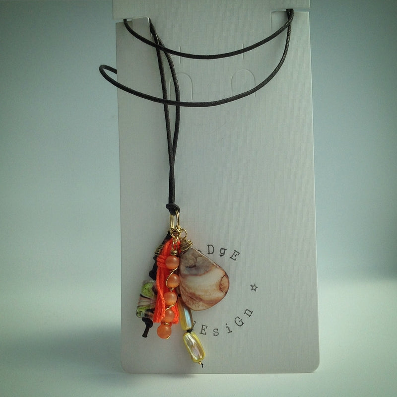 Multi-strand beaded pendant on adjustable cord necklace eDgE